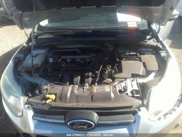 Photo 9 VIN: 1FADP3F28EL381597 - FORD FOCUS 