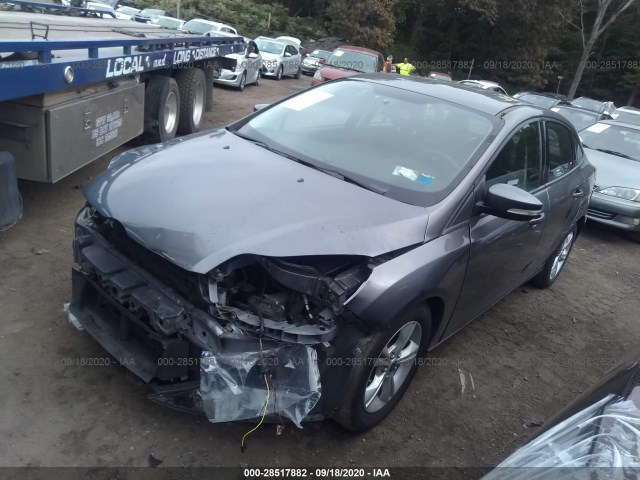 Photo 1 VIN: 1FADP3F28EL409124 - FORD FOCUS 