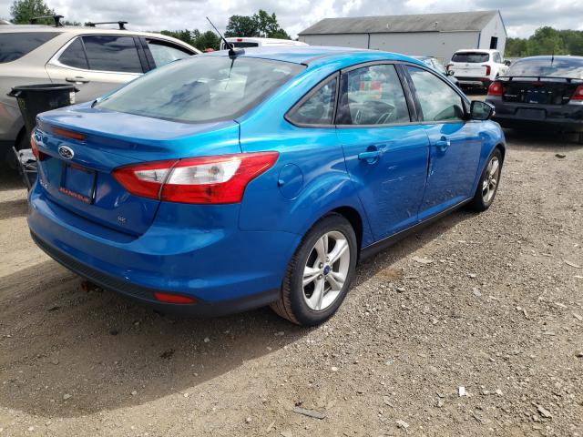 Photo 3 VIN: 1FADP3F28EL428403 - FORD FOCUS SE 