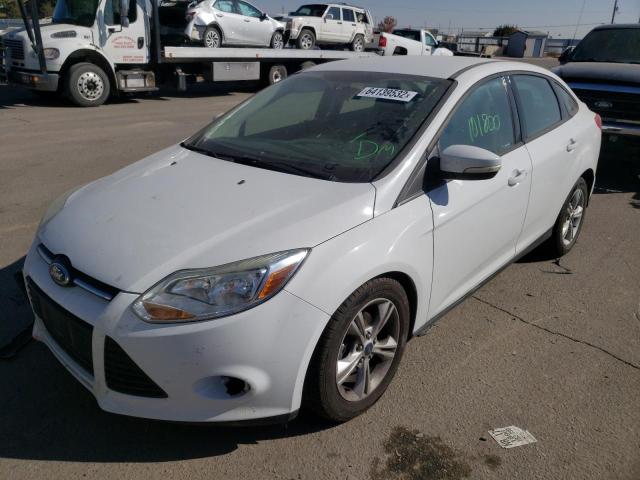 Photo 1 VIN: 1FADP3F28EL452782 - FORD FOCUS SE 