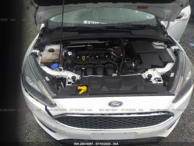 Photo 9 VIN: 1FADP3F28FL227344 - FORD FOCUS 