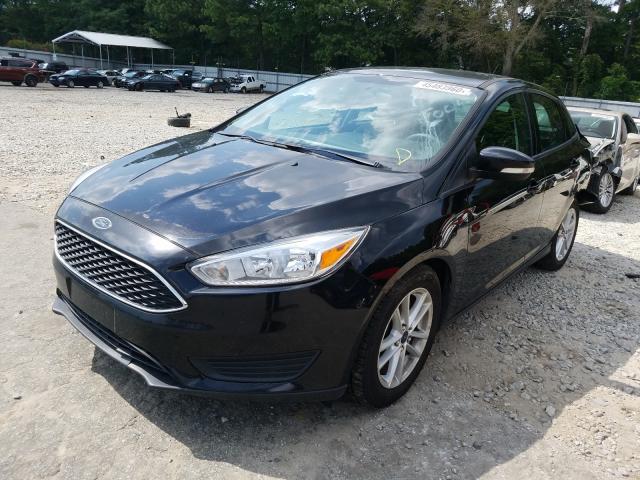 Photo 1 VIN: 1FADP3F28GL204308 - FORD FOCUS SE 