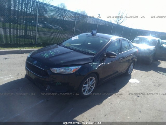 Photo 1 VIN: 1FADP3F28GL204762 - FORD FOCUS 