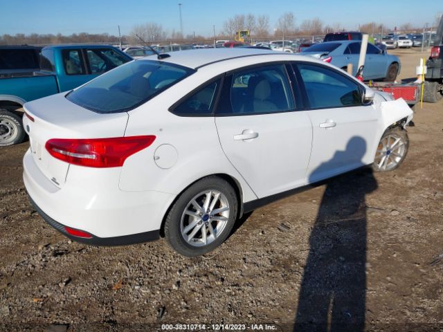 Photo 3 VIN: 1FADP3F28GL208357 - FORD FOCUS 