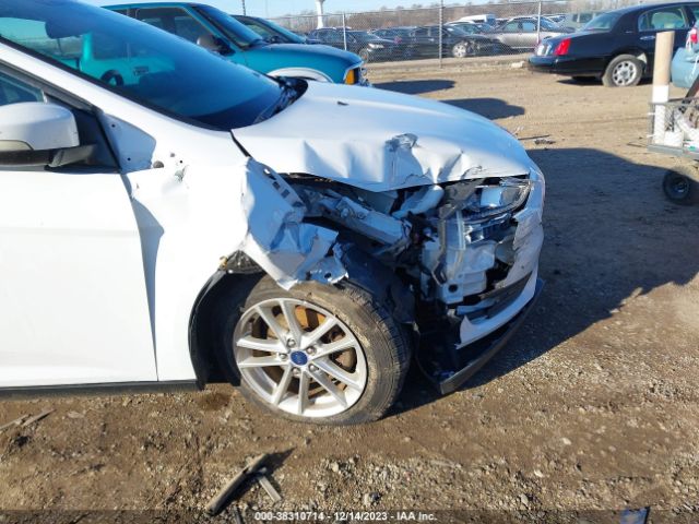 Photo 5 VIN: 1FADP3F28GL208357 - FORD FOCUS 