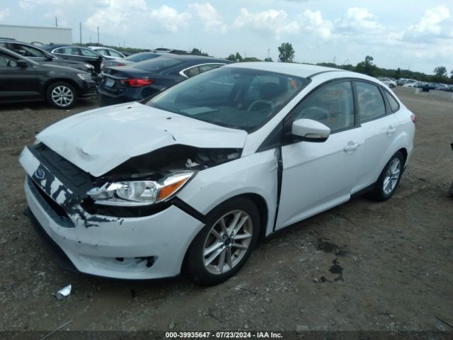 Photo 1 VIN: 1FADP3F28GL208410 - FORD FOCUS 