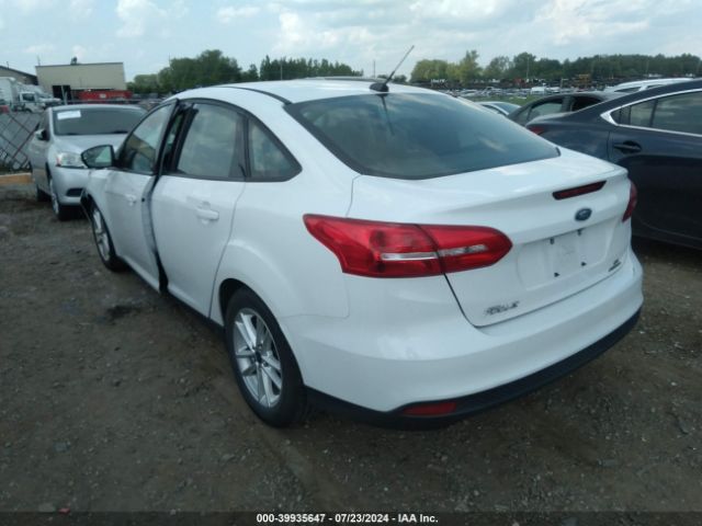 Photo 2 VIN: 1FADP3F28GL208410 - FORD FOCUS 