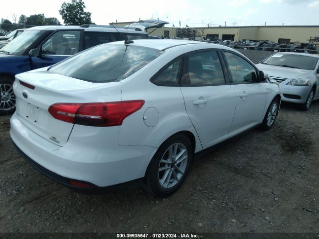 Photo 3 VIN: 1FADP3F28GL208410 - FORD FOCUS 