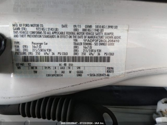 Photo 8 VIN: 1FADP3F28GL208410 - FORD FOCUS 