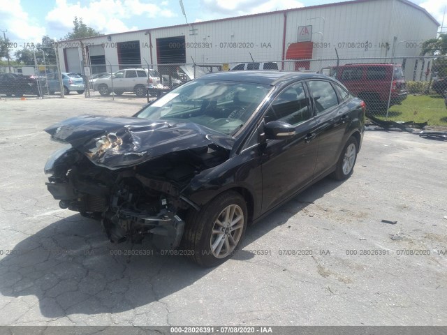 Photo 1 VIN: 1FADP3F28GL210982 - FORD FOCUS 