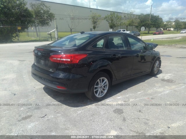 Photo 3 VIN: 1FADP3F28GL210982 - FORD FOCUS 