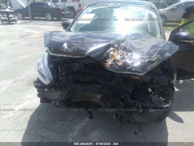 Photo 5 VIN: 1FADP3F28GL210982 - FORD FOCUS 