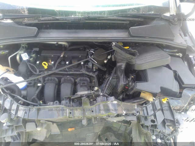 Photo 9 VIN: 1FADP3F28GL210982 - FORD FOCUS 