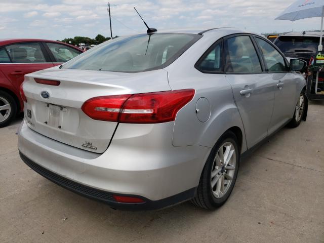 Photo 3 VIN: 1FADP3F28GL217043 - FORD FOCUS SE 