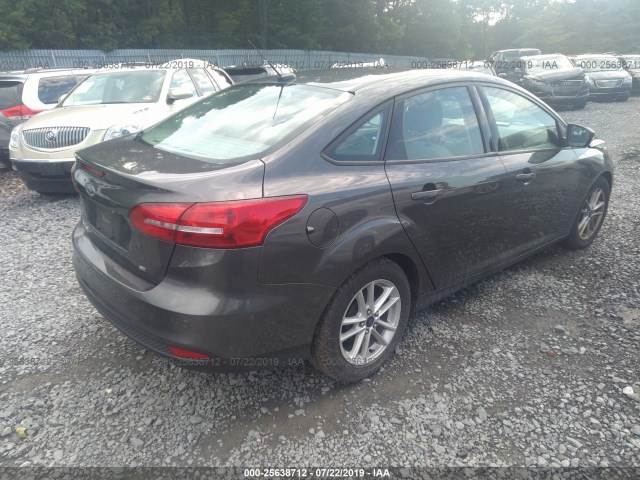 Photo 3 VIN: 1FADP3F28GL219004 - FORD FOCUS 