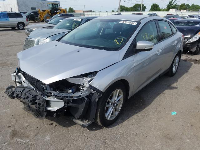 Photo 1 VIN: 1FADP3F28GL219228 - FORD FOCUS SE 