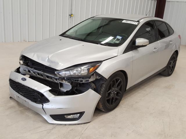 Photo 1 VIN: 1FADP3F28GL222114 - FORD FOCUS 