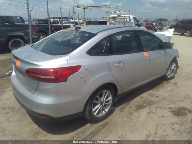 Photo 3 VIN: 1FADP3F28GL231010 - FORD FOCUS 