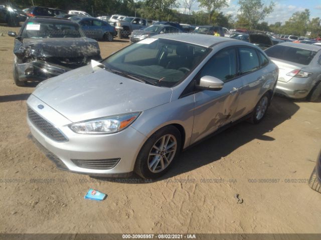 Photo 1 VIN: 1FADP3F28GL243349 - FORD FOCUS 