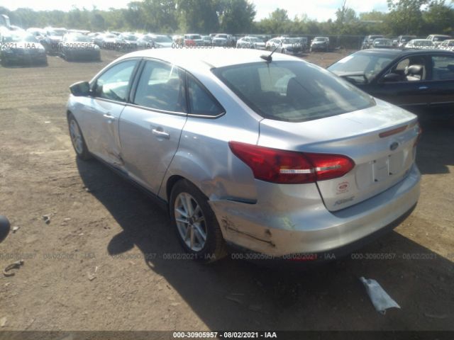 Photo 2 VIN: 1FADP3F28GL243349 - FORD FOCUS 