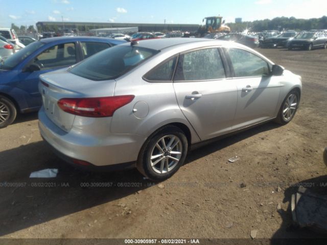 Photo 3 VIN: 1FADP3F28GL243349 - FORD FOCUS 