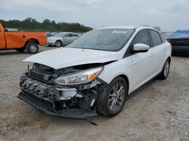 Photo 1 VIN: 1FADP3F28GL245506 - FORD FOCUS 4D 