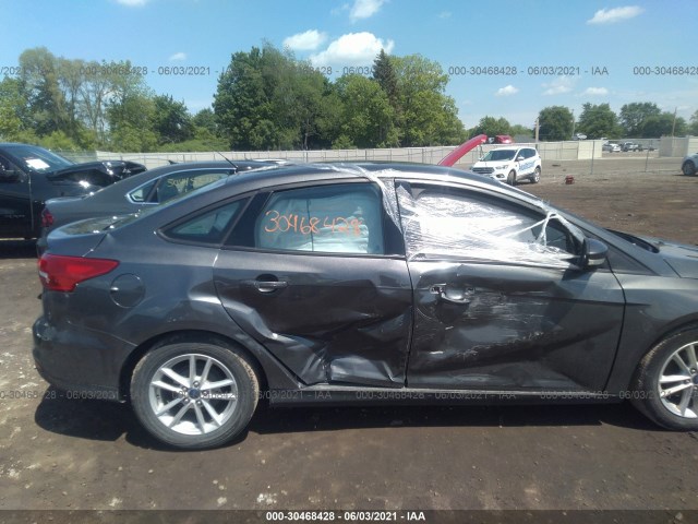 Photo 5 VIN: 1FADP3F28GL252438 - FORD FOCUS 