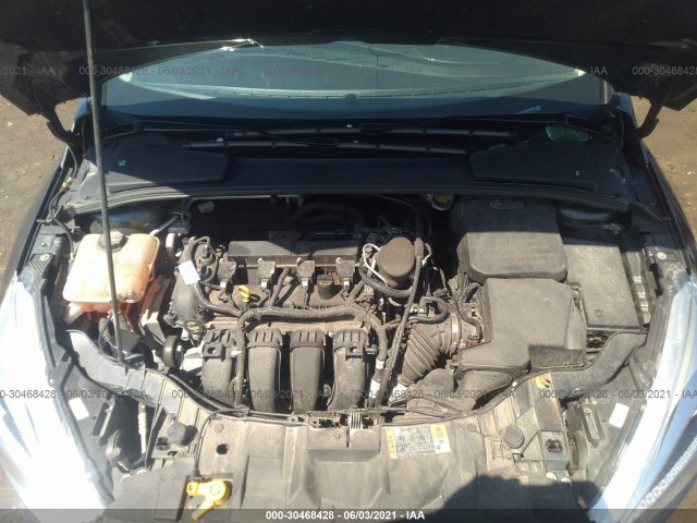 Photo 9 VIN: 1FADP3F28GL252438 - FORD FOCUS 