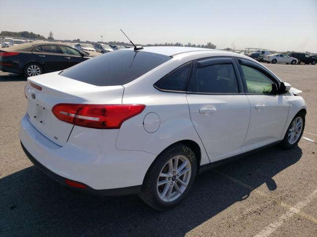 Photo 3 VIN: 1FADP3F28GL271586 - FORD FOCUS SE 