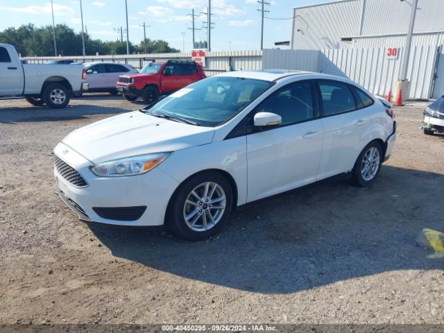 Photo 1 VIN: 1FADP3F28GL284063 - FORD FOCUS 