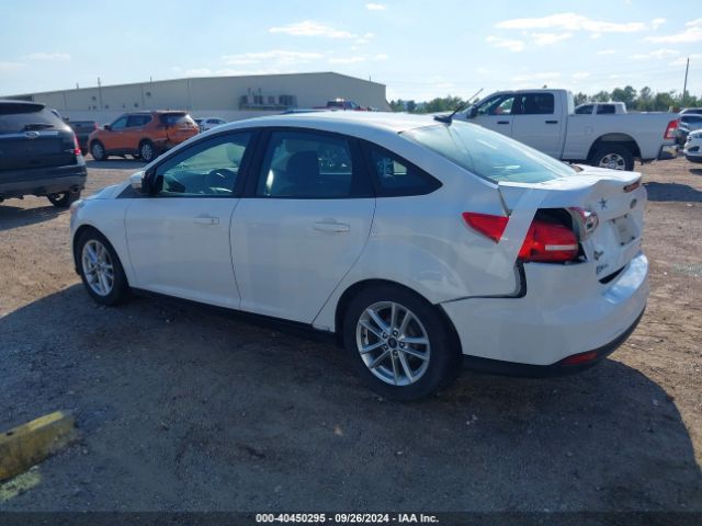 Photo 2 VIN: 1FADP3F28GL284063 - FORD FOCUS 