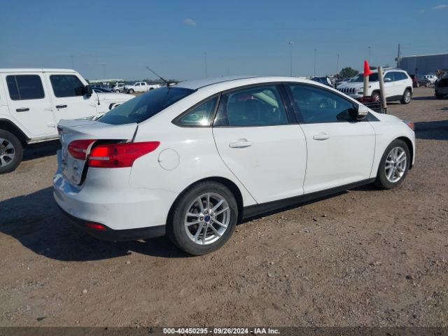 Photo 3 VIN: 1FADP3F28GL284063 - FORD FOCUS 