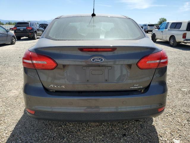 Photo 5 VIN: 1FADP3F28GL286301 - FORD FOCUS SE 