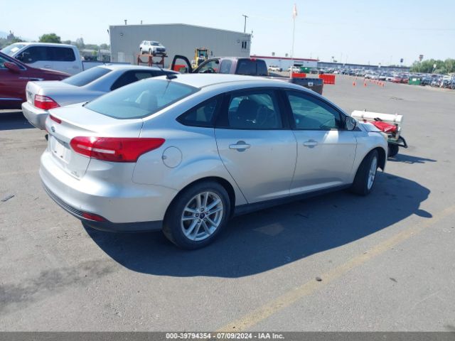 Photo 3 VIN: 1FADP3F28GL286329 - FORD FOCUS 