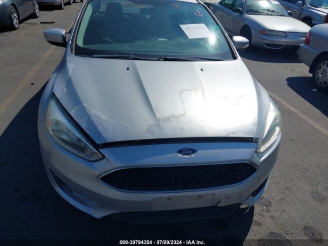 Photo 5 VIN: 1FADP3F28GL286329 - FORD FOCUS 