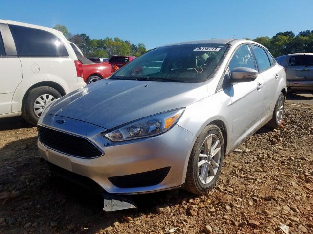 Photo 1 VIN: 1FADP3F28GL294284 - FORD FOCUS 