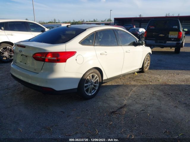 Photo 3 VIN: 1FADP3F28GL306739 - FORD FOCUS 