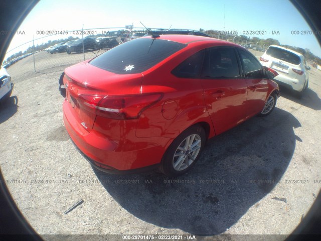 Photo 3 VIN: 1FADP3F28GL309124 - FORD FOCUS 