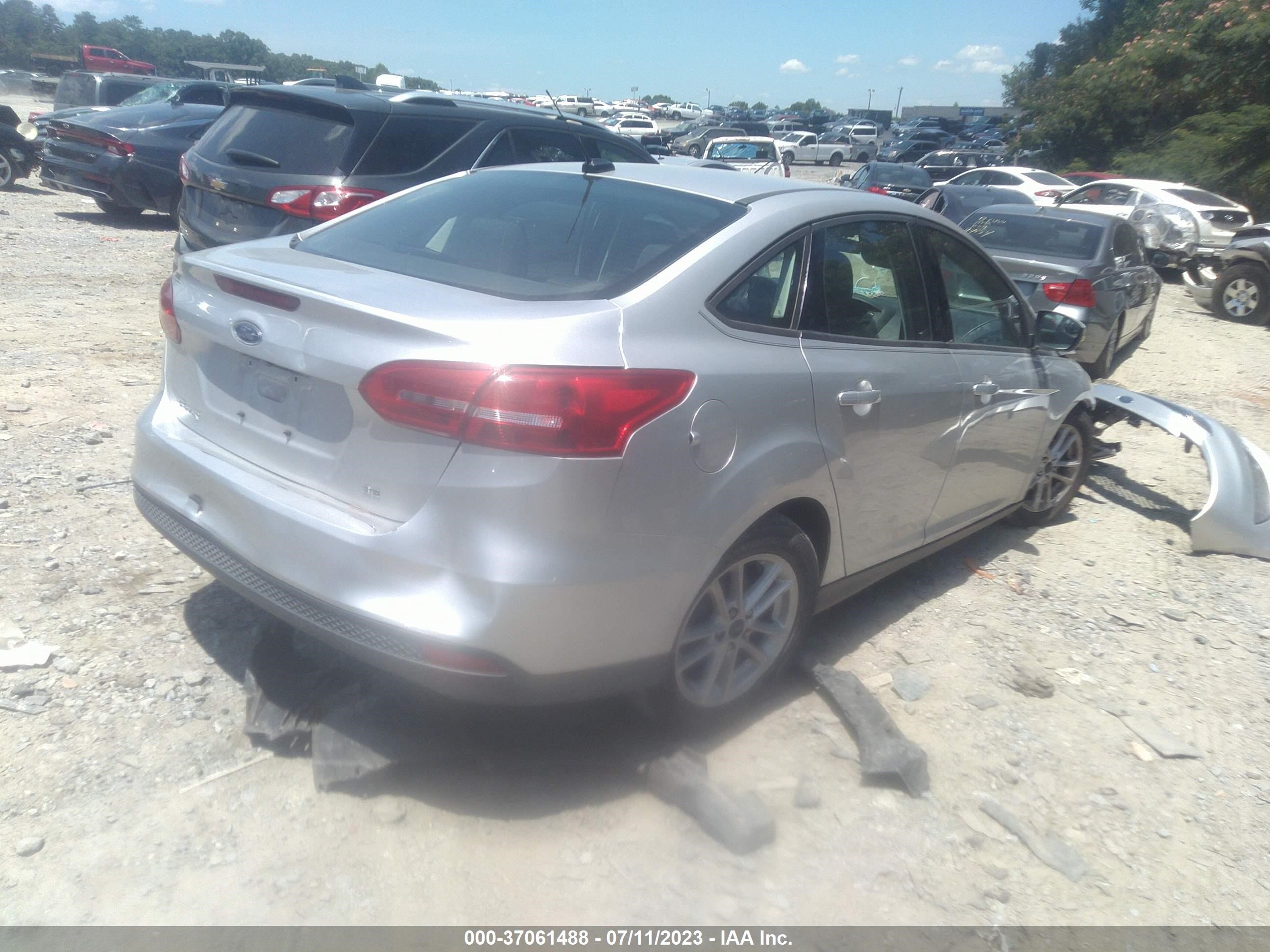 Photo 3 VIN: 1FADP3F28GL313318 - FORD FOCUS 