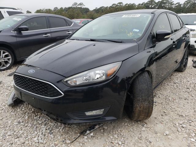 Photo 1 VIN: 1FADP3F28GL328109 - FORD FOCUS SE 