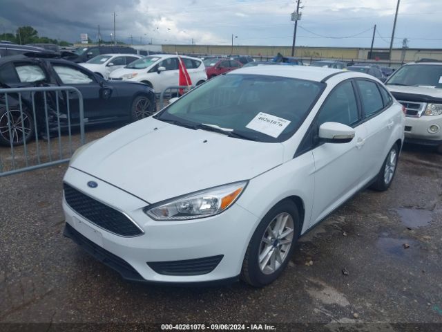 Photo 1 VIN: 1FADP3F28GL331849 - FORD FOCUS 