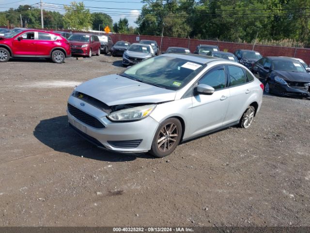 Photo 1 VIN: 1FADP3F28GL338784 - FORD FOCUS 