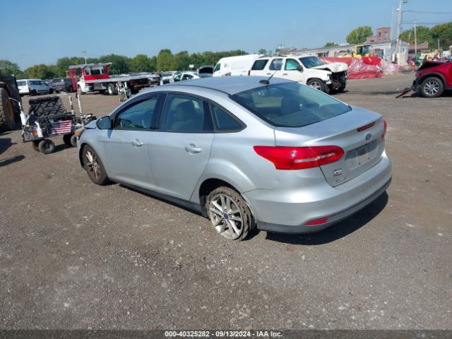 Photo 2 VIN: 1FADP3F28GL338784 - FORD FOCUS 