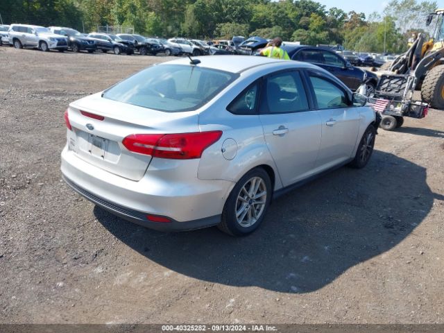 Photo 3 VIN: 1FADP3F28GL338784 - FORD FOCUS 