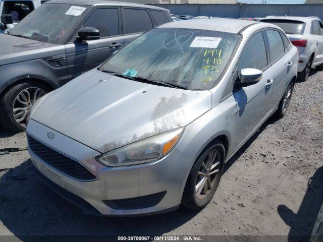 Photo 1 VIN: 1FADP3F28GL338994 - FORD FOCUS 