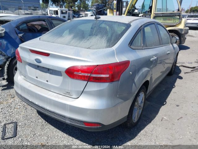 Photo 3 VIN: 1FADP3F28GL338994 - FORD FOCUS 