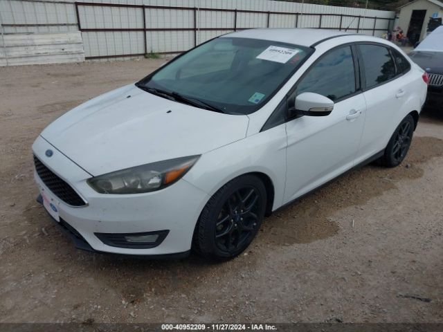 Photo 1 VIN: 1FADP3F28GL339546 - FORD FOCUS 