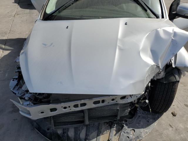 Photo 10 VIN: 1FADP3F28GL340745 - FORD FOCUS SE 