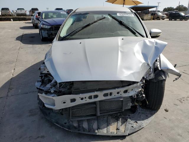 Photo 4 VIN: 1FADP3F28GL340745 - FORD FOCUS SE 