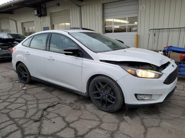 Photo 3 VIN: 1FADP3F28GL341894 - FORD FOCUS 